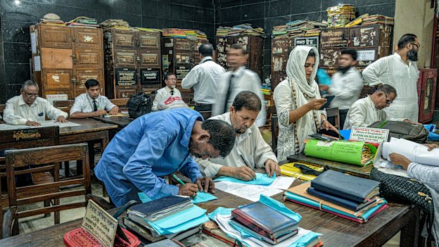 Lawyers crammed into a room at the Bar Association building in Dhaka, Bangladesh.