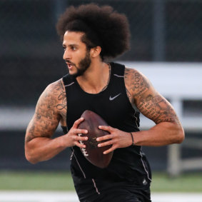 Still got it: Kaepernick lines up for a pass during his live-streamed audition.