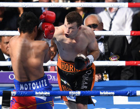 On the front foot: Jeff Horn takes the fight to Manny Pacquiao in their epic Brisbane bout.