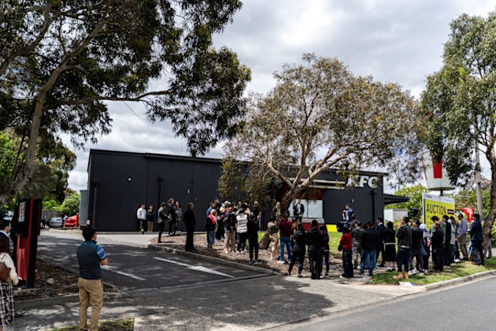 The crowd at the auction of the East Burwood KFC.