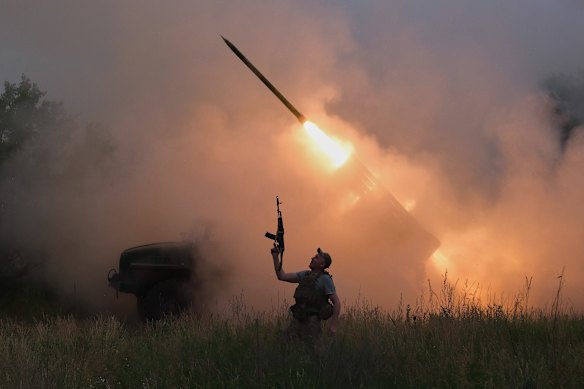  A soldier reacts as an MRLS BM-21 “Grad” fires at the Russian positions near Kostiantynivka, Donetsk region, Ukraine. 