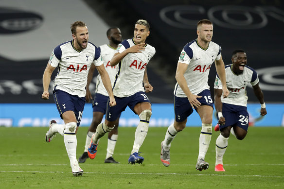 The Spurs celebrate their penalty shootout victory over Chelsea.