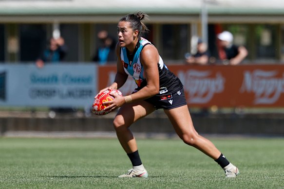 Justine Mules-Robinson of the Power gets a kick earlier this season.