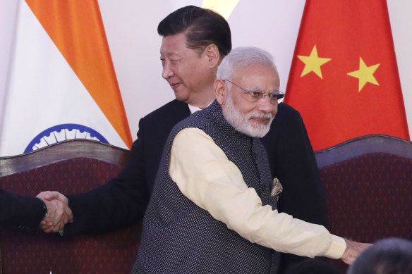 Chinese President Xi Jinping and Indian Prime Minister Narendra Modi. 