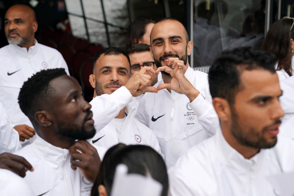 Kasra Mehdipournejad (right) and Iman Mahdavi of the Refugee Olympic Team pose for a photo at the opening ceremony of the Paris Games.