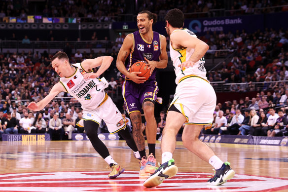 Xavier Cooks drives to the basket for the Kings.