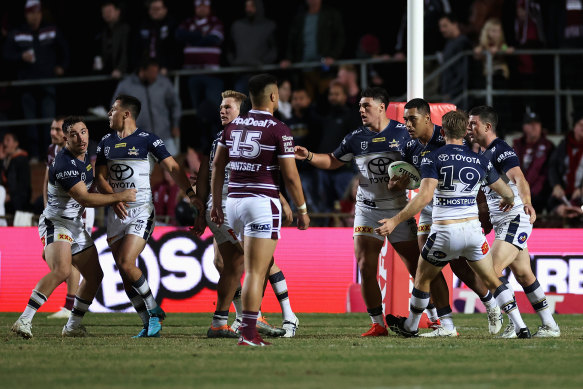 Connelly Lemuelu scores as the Cowboys storm home.