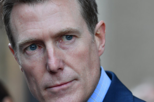 Claiming he is the winner: Christian Porter outside the Federal Court in Sydney on Monday.