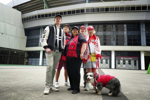 Left to right: Football fans Sean Stephens, Samuel Park, and Deb Ford  with Chris and Joy Blake.