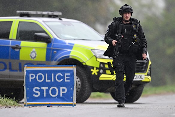Armed police maintain road blocks and security checks around RAF Fairford.