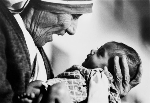 Mother Teresa cradles a baby at her order’s orphanage in India in 1978.