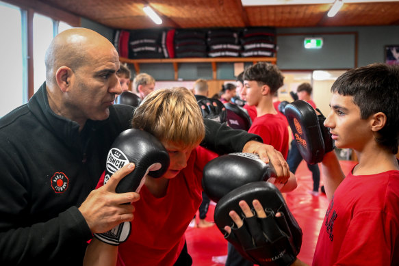 Frank Dando Sports Academy principal Ziad Zakharia leads a morning boxing session at the boys’ school.