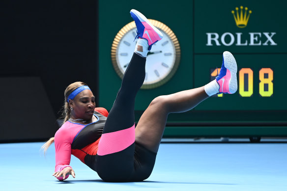 Serena Williams falls during  her clash with Aryna Sabalenka of Belarus on Sunday but escaped injury.