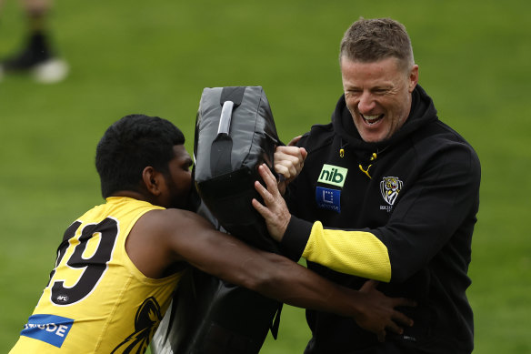 Maurice Rioli jnr gets a laugh out of coach Damien Hardwick at training this week.