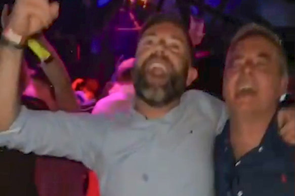 A still from a video purporting to show Ben Carter (left) and Sportsbet CEO Barni Evans (right) dancing in Darwin.