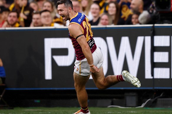 Conor McKenna celebrates his soccer goal against Hawthorn.
