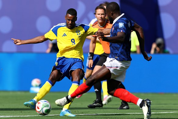Alexander Isak #9 of Sweden controls the ball.