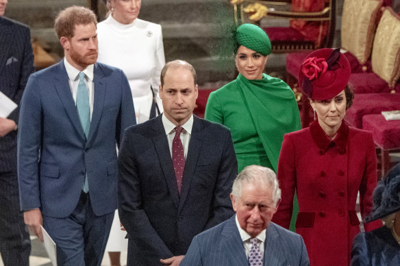 Prince Harry, Prince William, Meghan and Catherine with Charles – then the Prince of Wales – in 2020.