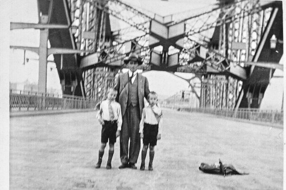 Engineer Frank Litchfield took sons Eric, left, and Ian, on a tour of the bridge in late 1931 before final road surfacing.