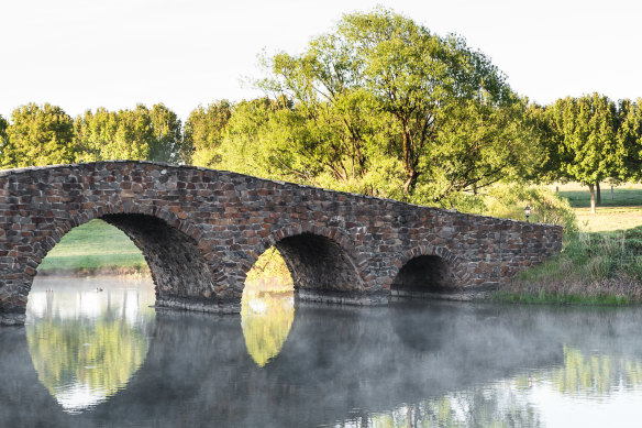 Linger on Mona Farm Homestead's Palladian-style bridge for platypus-spotting.