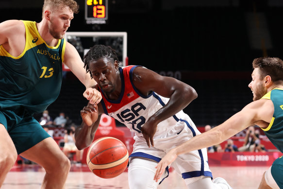 Jrue Holiday drives to the basket against the Boomers.