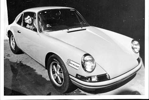 Passion for cars: A young Alan Hamilton pictured in 1968 in a new Porsche.