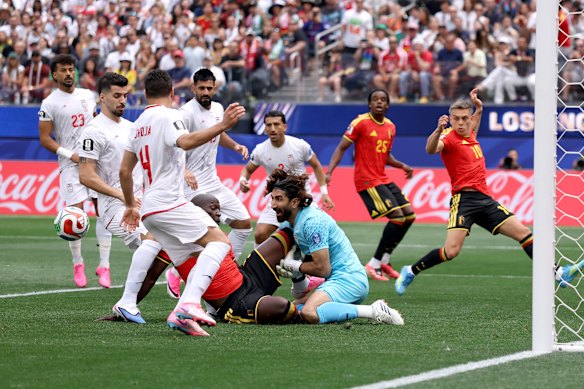 Beiranvand goes down under Lukaku’s challenge.