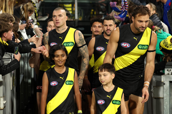 Toby Nankervis of the Tigers leads his team out.