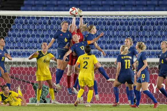 Sweden’s goalkeeper Hedvig Lindahl clears away the ball from an Australian attack.