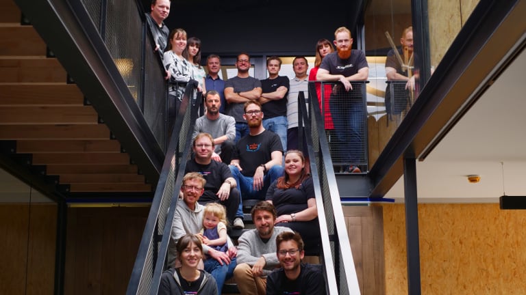 The Savage Interactive team. CEO James Cuda is top centre.