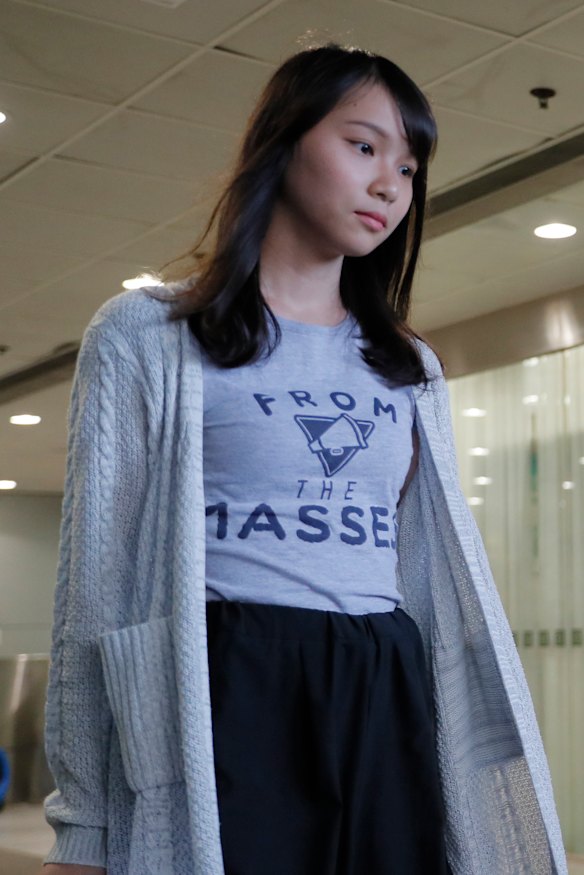 Pro-democracy leader Agnes Chow leaves a Hong Kong district court on Friday.