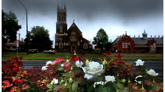 St Alipius Presbytary and church in Ballarat where ribbons are tied to the fence to symbolise the abuse of catholic priests.