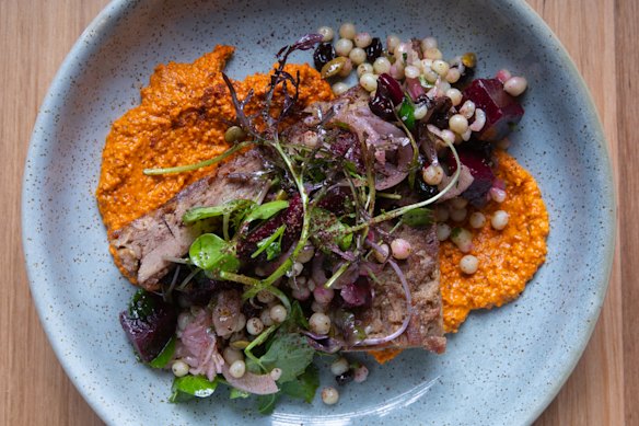 Lamb shoulder with smoked almond romesco.