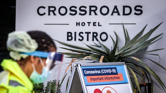 Medical staff at a pop-up COVID-19 testing clinic outside the Crossroads Hotel.