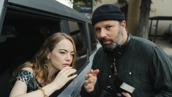 Emma Stone and director Yorgos Lanthimos on the set of Kinds of KIndness. 
