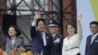 Taiwan’s new President Lai Ching-te, centre, Vice President Hsiao Bi-khim, right, and former president Tsai Ing-wen wave during Lai’s inauguration ceremonies in Taipei. 