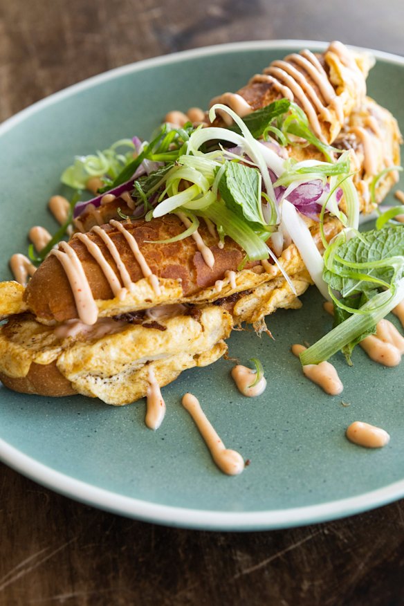 Roti John tiger roll filled with lamb shoulder and omelette.