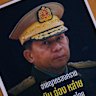 Thai protesters lay posters condemning Myanmar General Min Aung Hlaing on top of a sheet covered in fake blood in Bangkok, Thailand. Protesters gathered to oppose the presence of the junta leader, who is attending a regional summit for the first time since the military coup that brought him to power. 