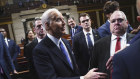 US President Joe Biden (left) departs after delivering the State of the Union address.