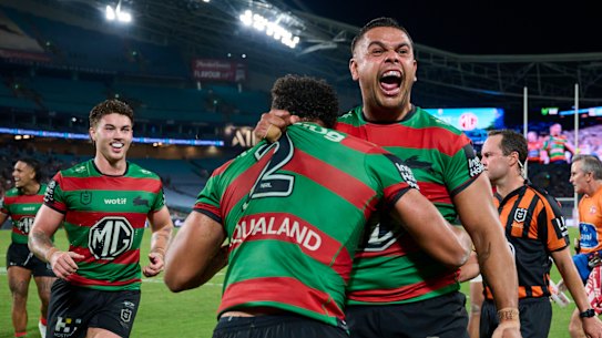 Latrell Mitchell celebrates Isaiah Tass’s match-winning try.