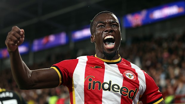  Michael Kayode celebrates a goal.