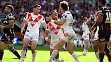 Valentine Holmes celebrates a try against the Broncos.