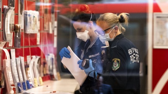 Police at a Service NSW office in  Haymarket after an employee there was stabbed.