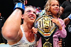 Mackenzie Dern celebrates with her daughter in 2025.