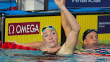 Lani Pallister edged out a fast-finishing Summer McIntosh to win the women’s 200m freestyle final.