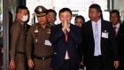 Thaksin Shinawatra greets supporters as he arrives at Don Mueang International Airport on August 22, 2023 in Bangkok, 
