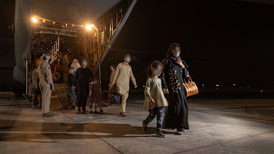 An RAAF C-130J Hercules evacuated 93 Afghans from Pakistan, who are now quarantining in Darwin.