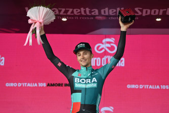 Jai Hindley celebrates on the podium after winning the ninth stage of the Giro d’Italia.