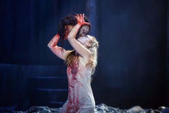 Victorian Opera's Salome, Vida Mikneviciute gets up close and personal with John the Baptist.