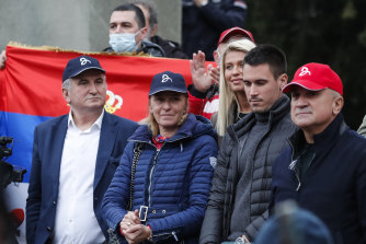 Novak Djokovic’s family - (left to right) Goran Djokovic, Dijana Djokovic, Djordje Djokovic and Srdjan Djokovic - attend a rally in support of the tennis star at the front of Serbia’s National Assembly on January 6.